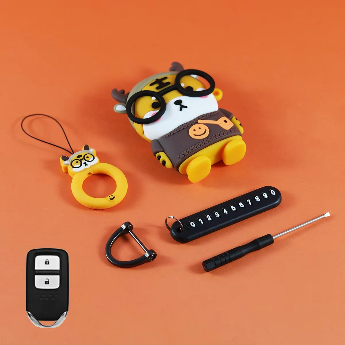 Tiger key fob cover with matching ring charm, clip, and number tag